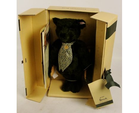 A boxed Steiff 1995 Harrods Centenary teddy bear, no. 653148, with numbered white and red tag to ear, with green fur, with si