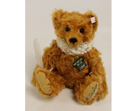 A boxed Steiff 1998 Poet teddy bear, no. 653186, retailed by Harrods, with numbered white and red tag to ear, with curly brow