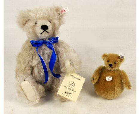 A boxed Steiff 2003 Rolly Polly weighted replica 1909 teddy bear, no. 406652, with numbered white and black tag to ear, with 