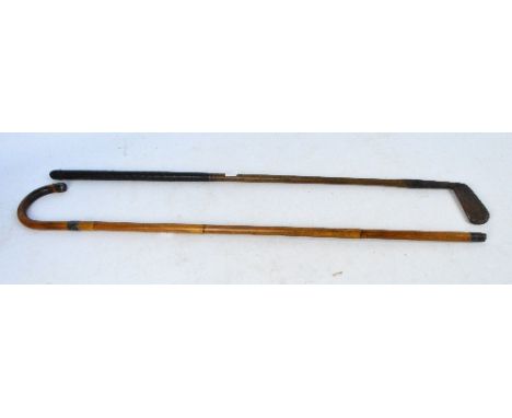 A George V hallmarked silver mounted bamboo walking cane, HJ Cooper & Co Ltd, London 1922, length 87.5cm, a vintage putter, s