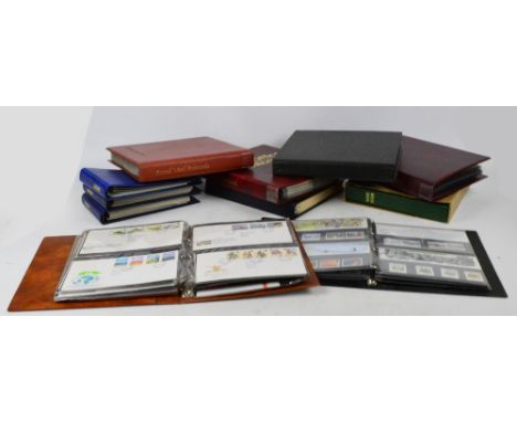 GREAT BRITAIN; packs and PHQ cards and first day covers collection in albums, also some world and Jersey etc.