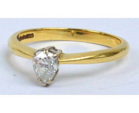 An 18ct yellow gold diamond solitaire ring, the pear shaped stone in six claw setting, size R, approx 3.7g.