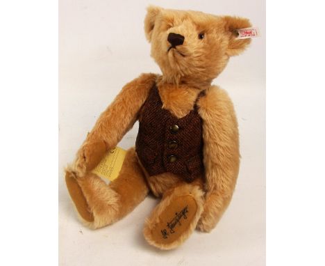 A boxed British Collectors' 1996 Steiff teddy bear, no. 654411, with numbered white and red tag to ear, with blonde mohair fu