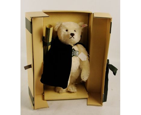 A boxed Steiff 1994 Edwardian Opera teddy bear, no. 653131, with numbered white and red tag to ear, with white fur and an ope