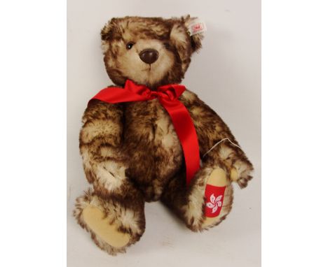 A boxed Steiff 1997 Harmony teddy bear, no. 652615, with numbered white and red tag to ear, produced for the integration of H