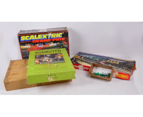 A boxed Scalextric Grand Prix electric model racing set, a boxed Hornby OO gauge train set, a boxed Subbuteo table soccer etc