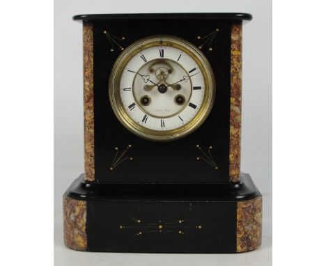 A late 19th century French black slate and marble detailed mantel clock, with circular two piece white enamel dial with visib
