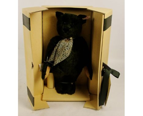 A boxed Steiff 1995 Harrods Centenary teddy bear, no. 653148, with numbered white and red tag to ear, with green fur, with si