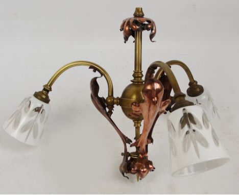 An 1890s Arts and Crafts brass and copper three branch ceiling lamp with Bohemian white enamel painted tapering shades, heigh