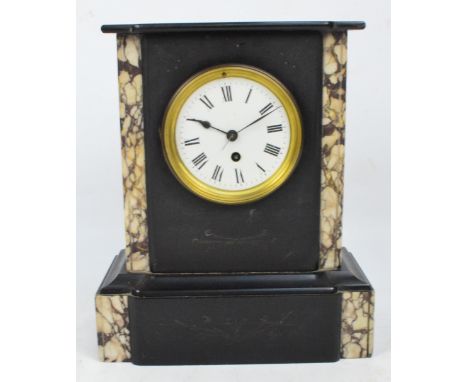 A late 19th century French black slate and marble thirty hour mantel clock, the circular enamel dial set with Roman numerals,