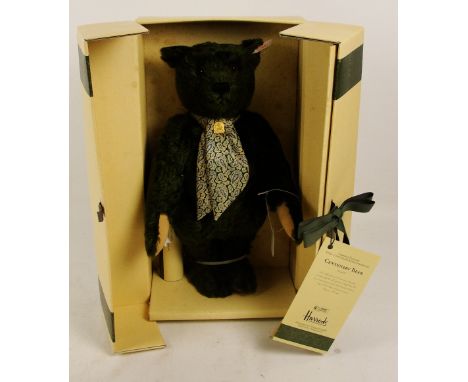 A boxed Steiff 1995 Harrods Centenary teddy bear, no. 653148, with numbered white and red tag to ear, with green fur, with si