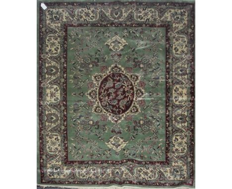 A green ground Tabriz carpet, 280 x 200cm.