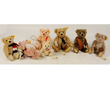 A family of seven Steiff bears issued by Danbury Mint, all with yellow and red tags to ears, comprising father Chester, mothe