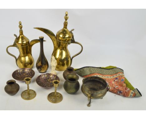 Two Eastern brass coffee pots, taller height 36cm, a pair of copper floral decorated dishes, three globular vases, a Greek ke