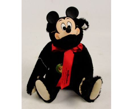 A Steiff Walt Disney World Teddy Bear Convention 1991 teddy bear, no. 011269, with numbered white and black tag to ear, with 