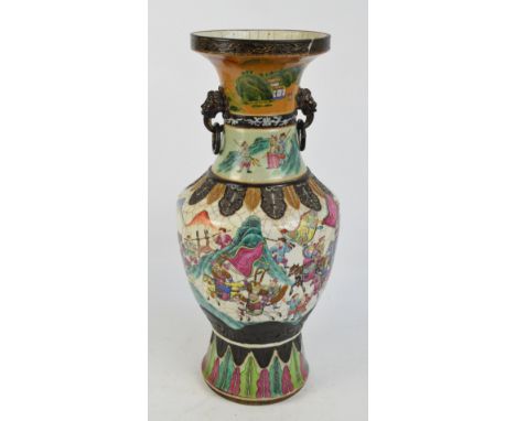 A large late 19th/early 20th century Chinese crackle glaze vase of baluster form with flared rim and mask and ring handles, o