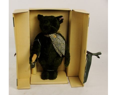 A boxed Steiff 1995 Harrods Centenary teddy bear, no. 653148, with numbered white and red tag to ear, with green fur, with si