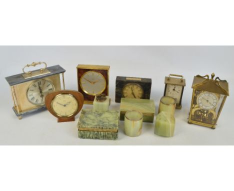 A collection of various clocks to include a Schatz anniversary clock in glazed lantern shaped case, height 20.5cm, a simulate