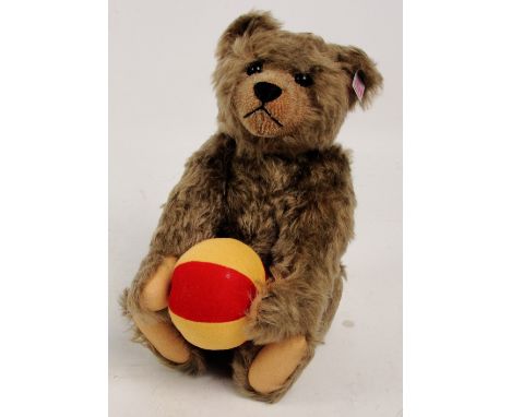 A boxed Steiff Archie the Attic teddy bear, no. 660832, retailed by Harrods and presented in a Harrods hat box, with numbered