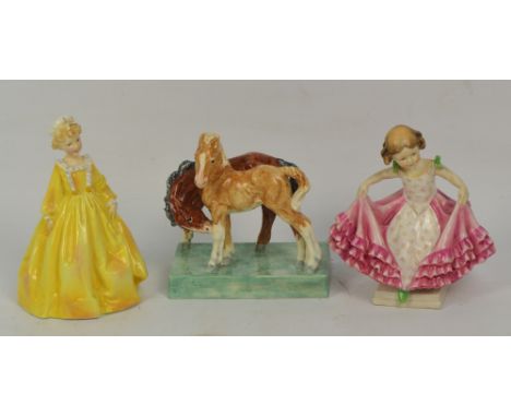 A Royal Worcester group of two foals modelled by Doris Lindner, no.3152 and two Royal Worcester figures; 3081 "Grandmother's 