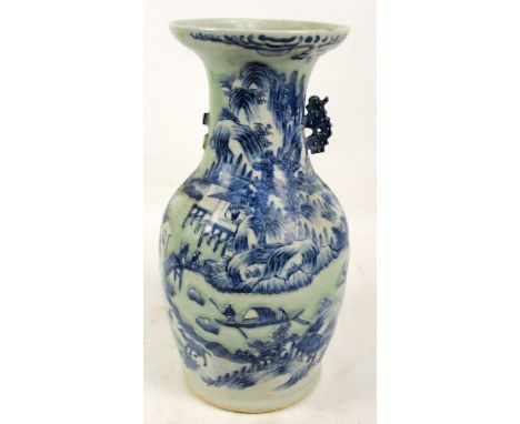 A large Chinese celadon glazed twin handled baluster vase painted in underglaze blue with architectural landscape, unmarked, 