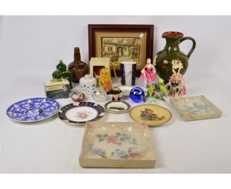A quantity of decorative ceramics including a Royal Doulton figure; HN2804 "Nicola" (second quality), a Goebel figure of a yo