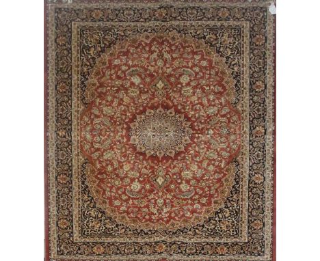 A tan ground Keshan carpet, 230 x 160cm.