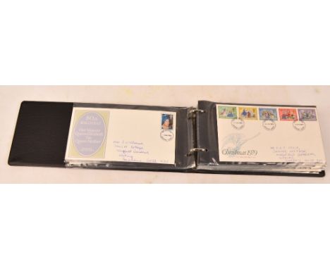 FIRST DAY COVERS in a small album.