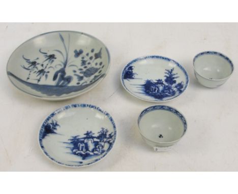 A pair of Nanking cargo blue and white tea bowls and saucers, diameter of saucer 10.5cm, and a Tek Sing blue and white saucer