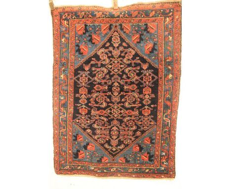 A Persian blue ground Malayer carpet with floral border and large central medallion, 139 x 101cm 