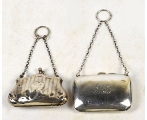 A George V hallmarked silver rectangular purse of plain form with suspension chain, initialled "ML", makers mark rubbed, Birm