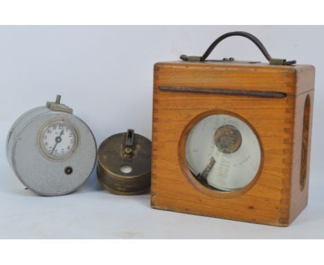 A Dent of London workman's recording clock, no.73095, in brass case and leather travelling case, also two pigeon clocks (3.