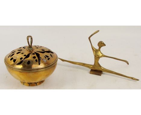 An Arts and Crafts brass circular pot pourri, the detachable lid with floral and foliate pierced decoration and with wire scr