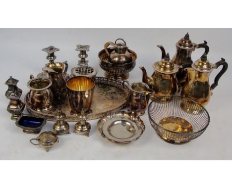 A quantity of silver plated items including a five piece tea and coffee service, a pair of candlesticks, cruets, bowls, a mug