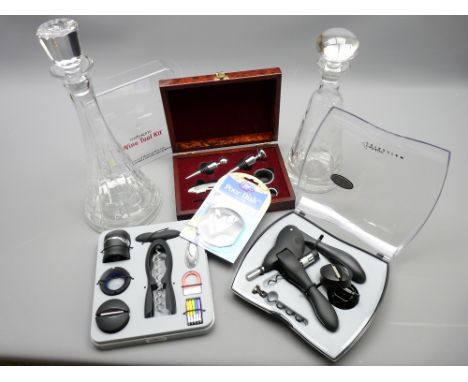 TWO MODERN GLASS DECANTERS &amp; THREE CASED SETS OF WINE &amp; CHAMPAGNE CORKING TOOLS, STOPPERS