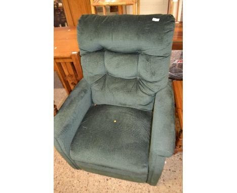 A green material covered recliner armchair (Item 53 on vendor list)
