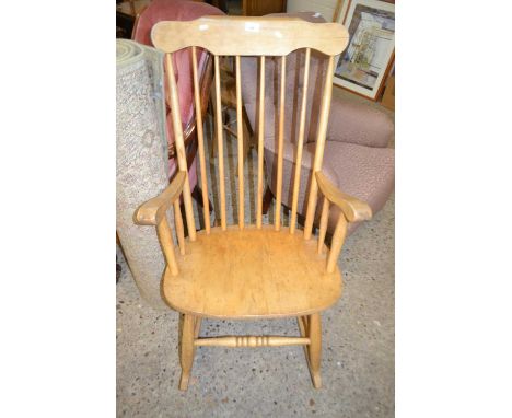 A mid Century Ercol style stick back rocking chair