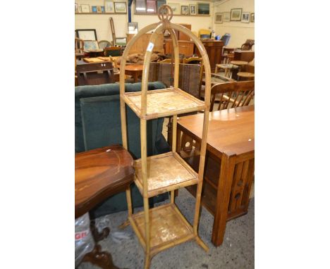 A bamboo three tier what-not, 150cm high (Item 86 on vendor list)