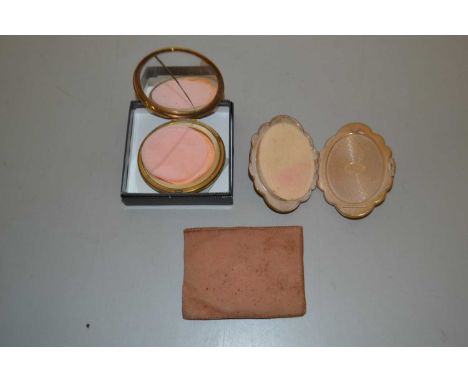 A lady's Stratton compact and another, the round compact with foliate decoration to front, in original Stratton box; together