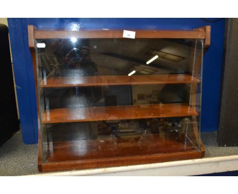 A vintage Timex watch shop display cabinet