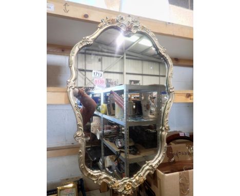 Large decorative gilt framed mirror, 74 x 47 cm. Not available for in-house P&amp;P 