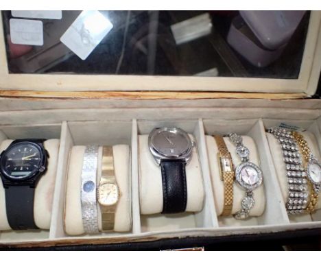 Watch display box containing mixed ladies and gents dress wristwatches. UK P&amp;P Group 2 (£20+VAT for the first lot and £4+