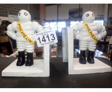 Cast iron Michelin man bookends, H: 10 cm. UK P&amp;P Group 1 (£16+VAT for the first lot and £2+VAT for subsequent lots) 