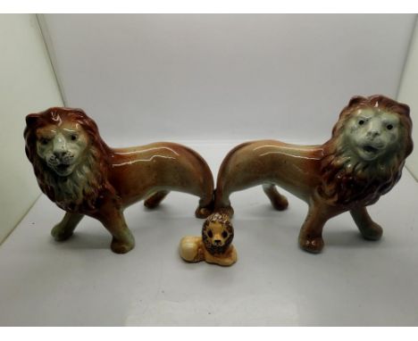 Pair of Victorian ceramic lions and another. UK P&amp;P Group 2 (£20+VAT for the first lot and £4+VAT for subsequent lots) 