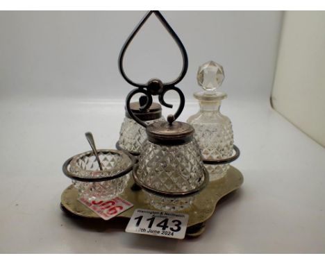 Silver plated and glass cruet set with hallmarked silver tops. UK P&amp;P Group 1 (£16+VAT for the first lot and £2+VAT for s