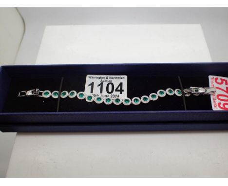 Swarovski boxed green stone set bracelet. UK P&amp;P Group 1 (£16+VAT for the first lot and £2+VAT for subsequent lots) 