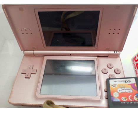 Nintendo DS Lite in pink, with junior classic games. UK P&amp;P Group 1 (£16+VAT for the first lot and £2+VAT for subsequent 