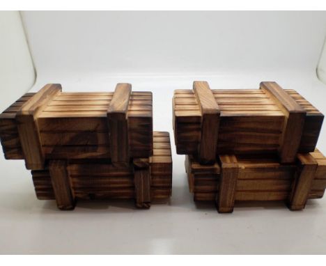 Four Japanese puzzle boxes, L: 12cm. UK P&amp;P Group 1 (£16+VAT for the first lot and £2+VAT for subsequent lots) 