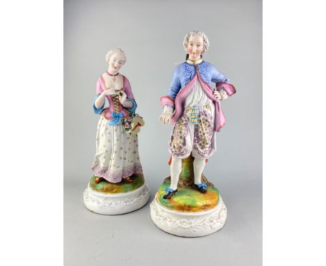 PAIR OF 19TH CENTURY BISQUE CERAMIC FIGURES, of a man and woman, 44cm and 42cm high