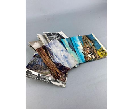 LARGE LOT OF VINTAGE POSTCARDS, contained across two boxes, comprising various postcards including British and international 